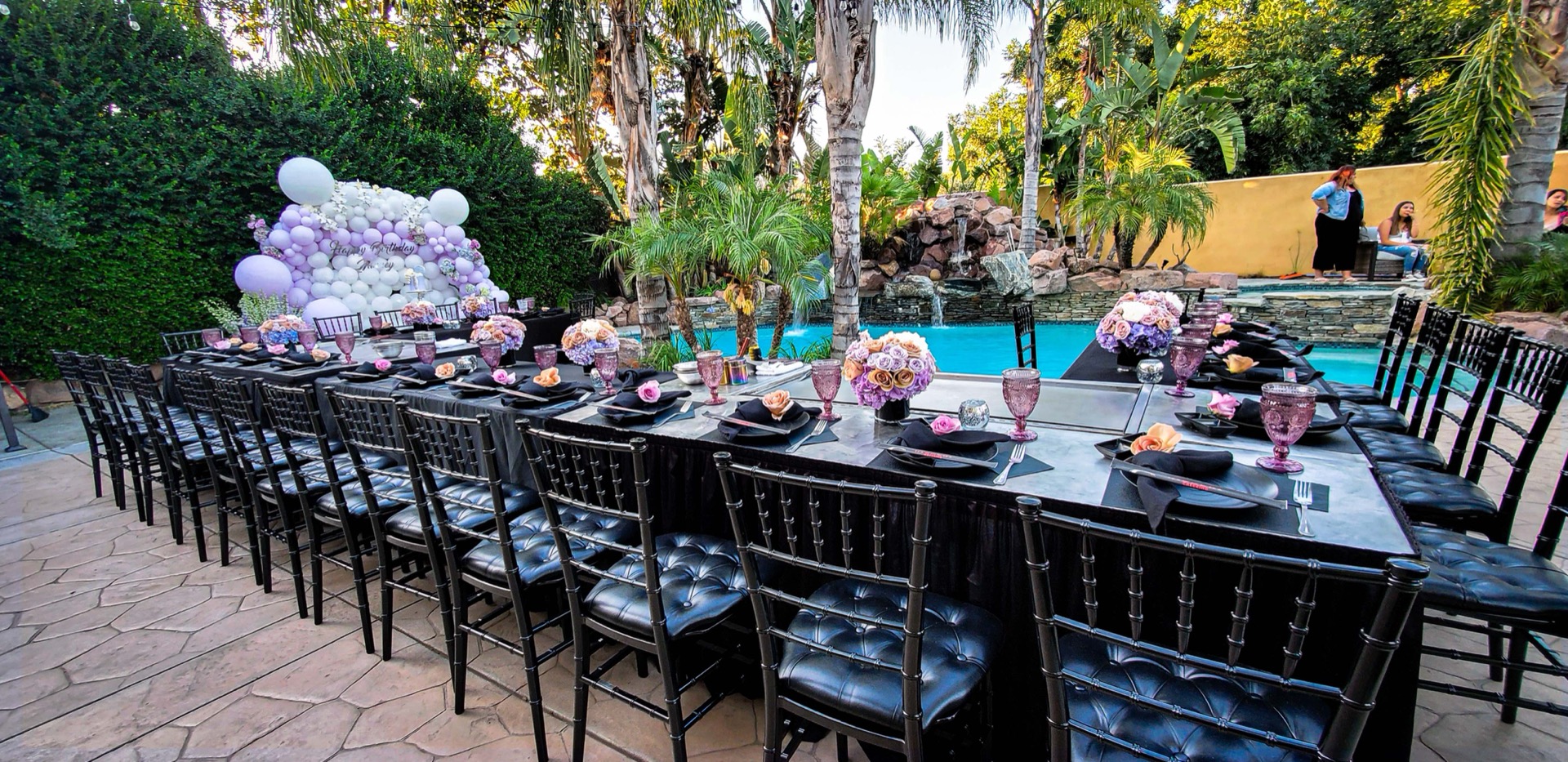 Elegant hibachi tablescape with chefs preparing plates