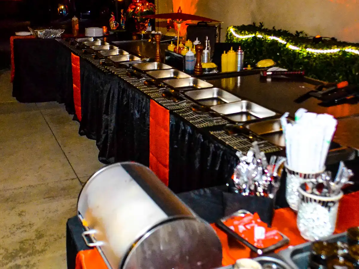 Large hibachi buffet spread ready for guests at an event